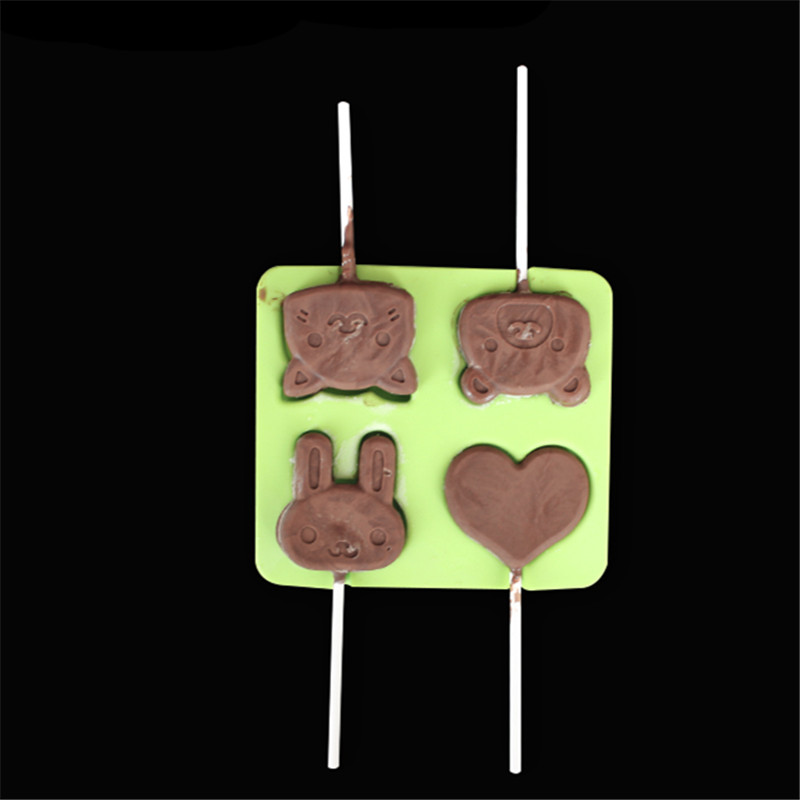 1pc 4 дупки силикони бонбони мувла симпатична срце и да носат дизајни силиконски калап за бонбони чоколадо